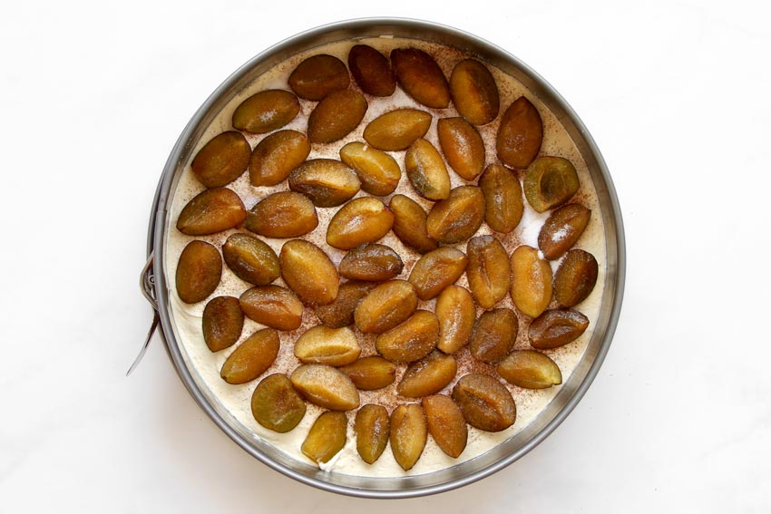 cake with arranged plums