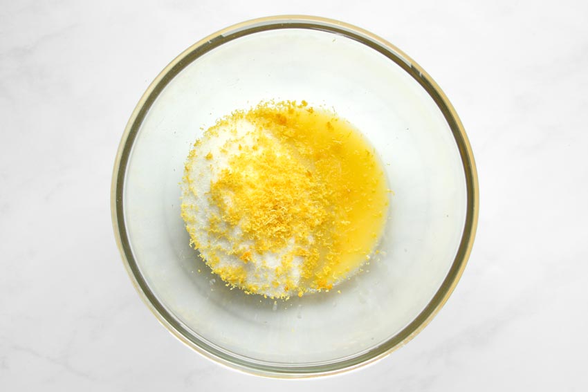 sugar, melted butter and lemon zest in bowl